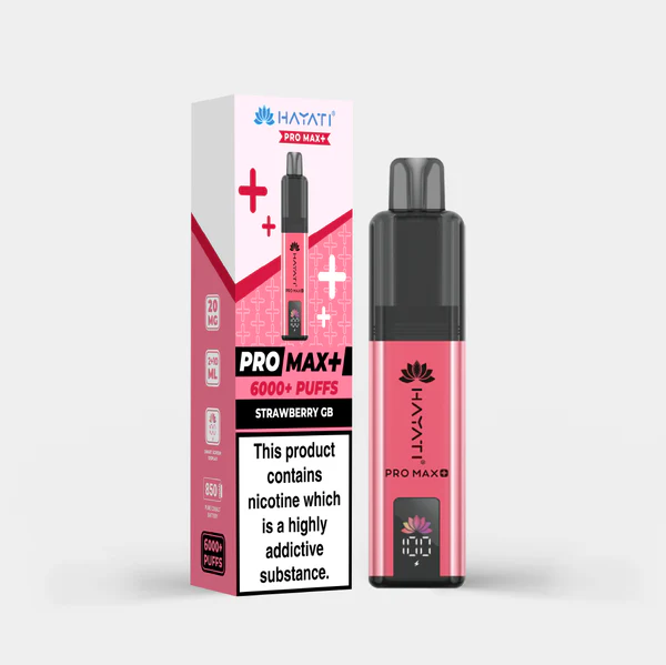 Pink disposable vape pen with black mouthpiece beside its pink and white box labeled PRO MAX+ 6000+ Puffs, Strawberry GB, showing branding and flavor.